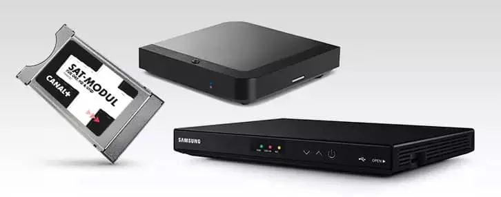 CI+ module, streaming box, and receiver displayed side by side for TV use.
